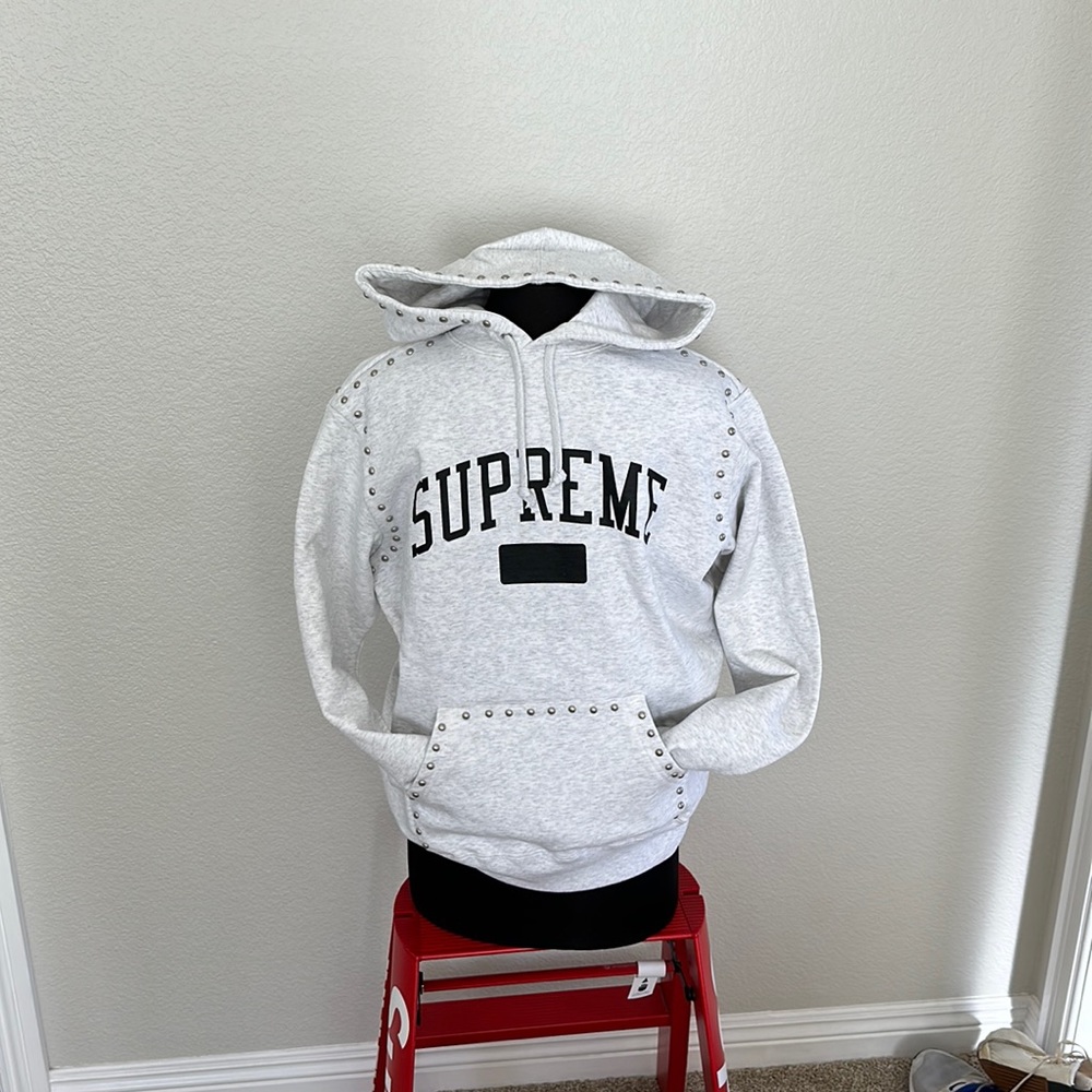 Supreme gray studded hoodie.